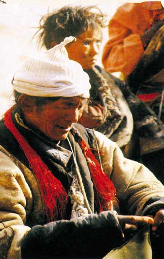 Gelzang Wangdu,the merchant,selling clothes.
