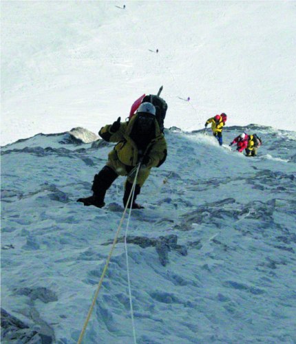 Luodro and other key members are struggling along the steep path from Camp 2 to Camp 3.