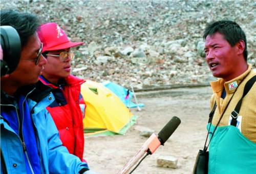 On September 13th in 1992, a Japanese Television reporter interviewed Tsering Dorje, the first mountaineer to reach the summit of Mt. Namjabarwa.  Photo by Dorje Dradul