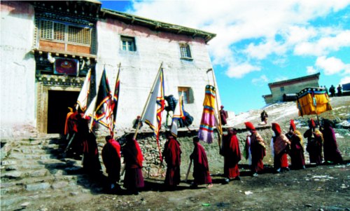 Color guard in a religious ceremony in Rtse Drugdgon Monastery.